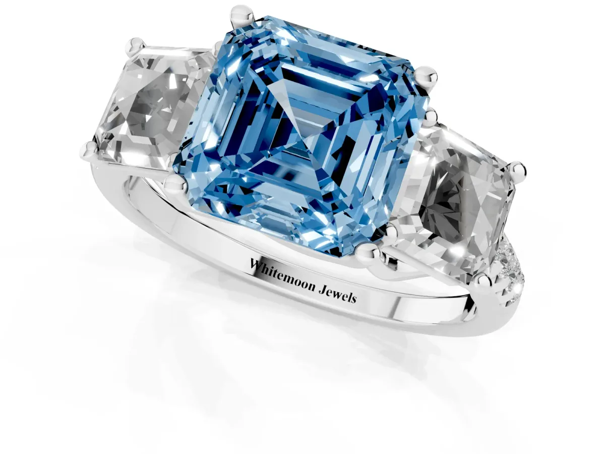 Fancy Blue Three-Stone Asscher Cut Diamond Ring with Round Pavé Band and Prong Setting Silver