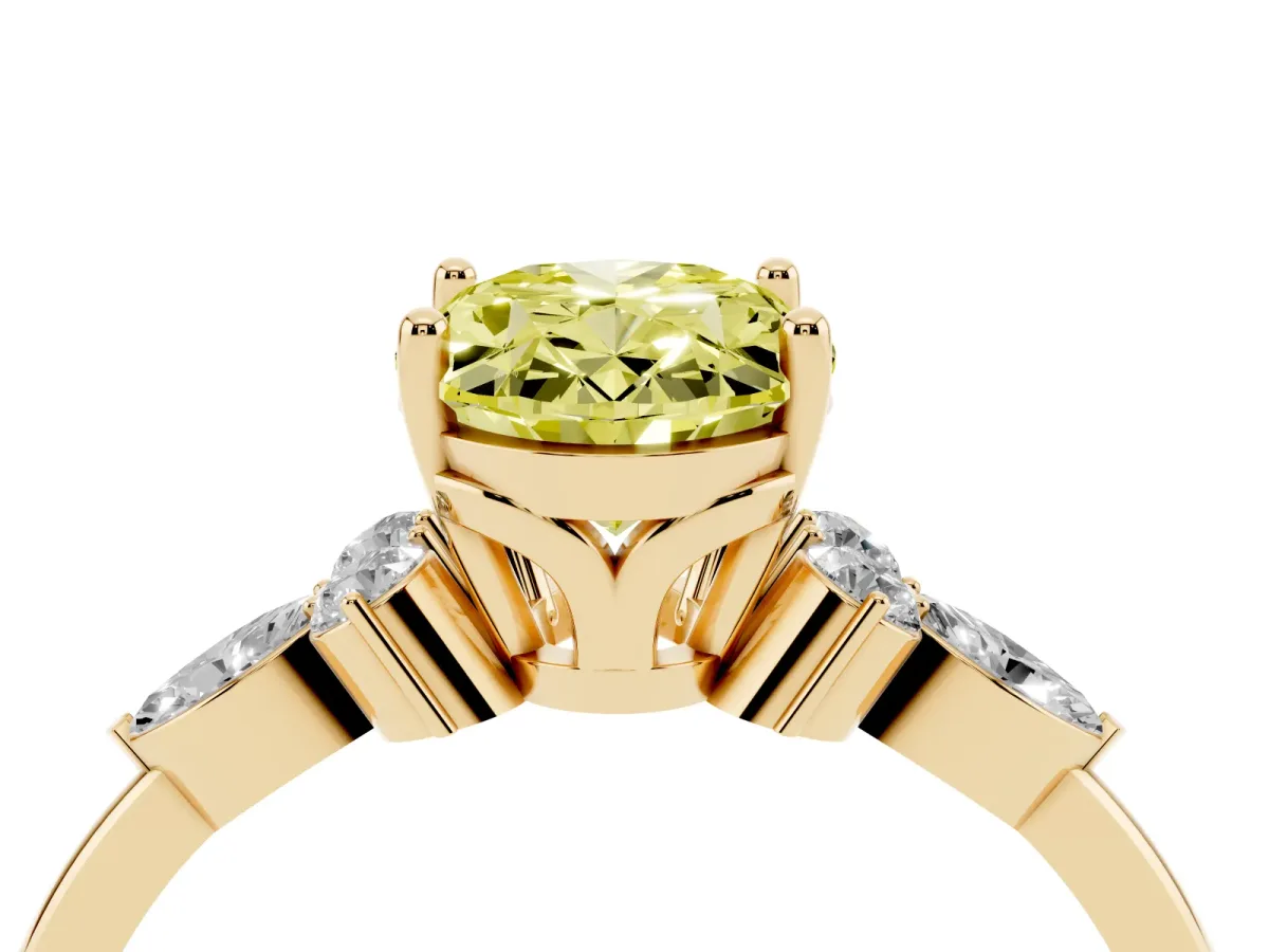 Fancy Yellow Oval Cut Brilliant Diamond Solitaire Ring with Pear Side Stones and Four-Prong Setting Yellow gold