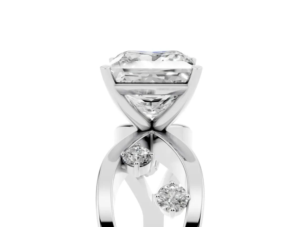 Princess Cut Cut Solitaire Diamond with Side Stones on Criss-Cross Band and Four-Prong Setting Silver