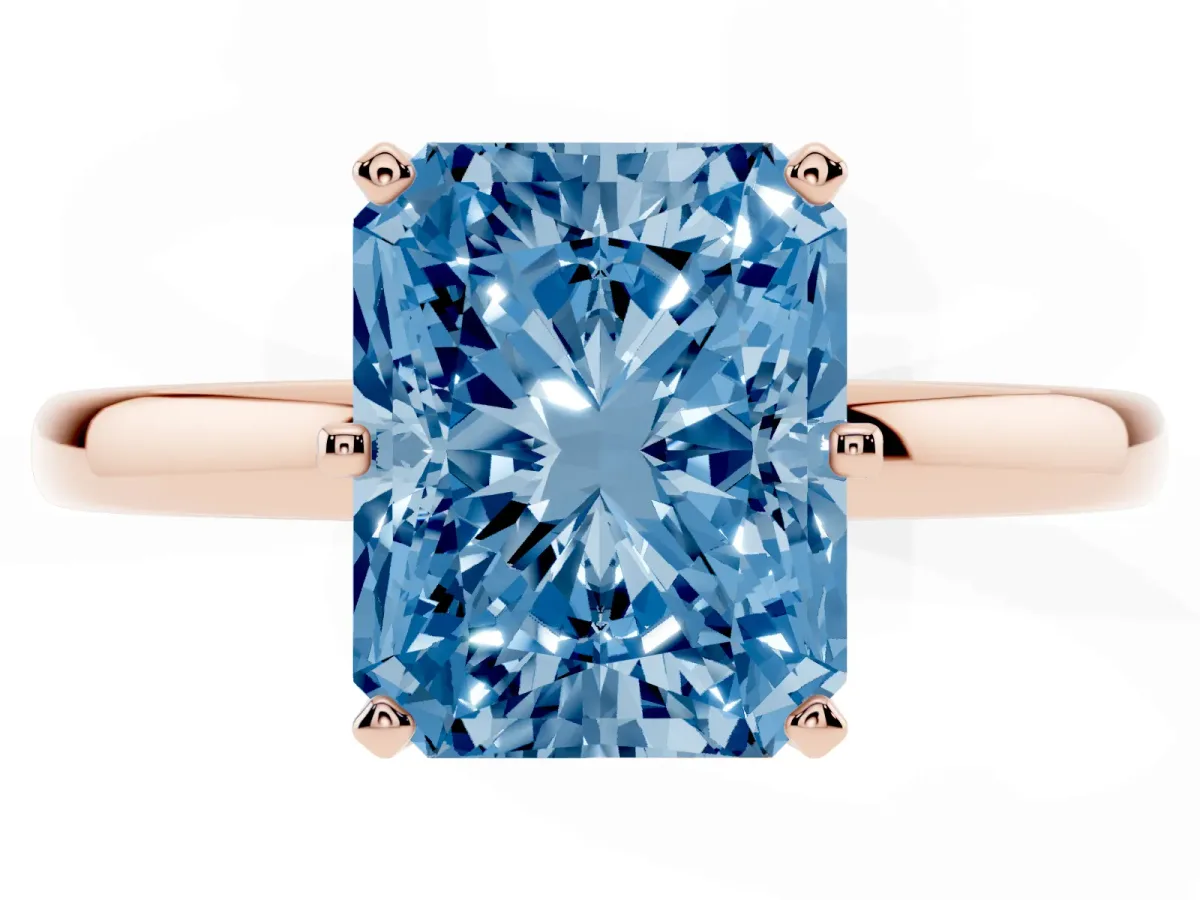 Fancy Blue Radiant Cut Solitaire Diamond Ring with Six-Prong Setting on a Classic Band Rose gold
