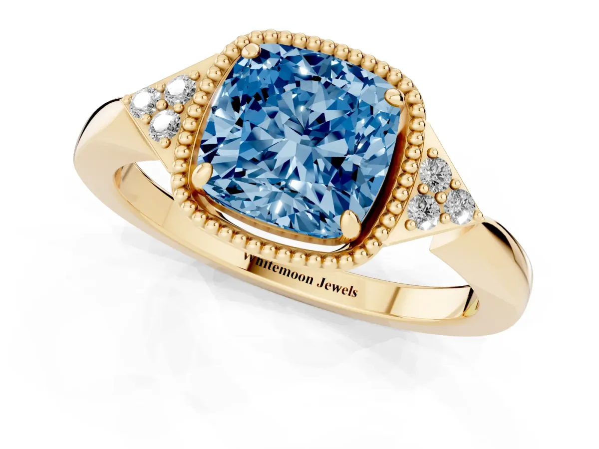 Fancy Blue Cushion Cut Diamond Halo Ring with Tapered Band and Four-Prong Setting Yellow gold