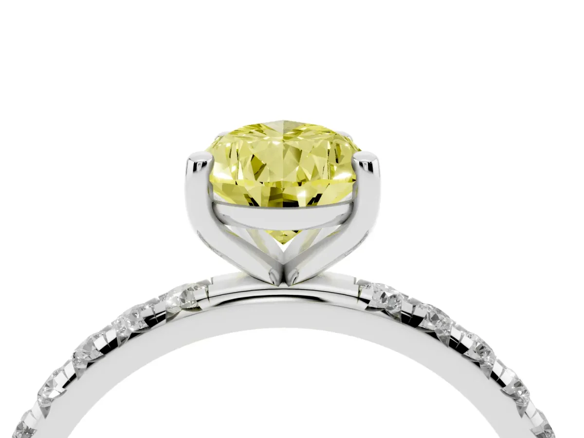 Fancy Yellow Pear Cut Cut Diamond Solitaire Ring with Micro Pave Band and Four Prong Setting Silver