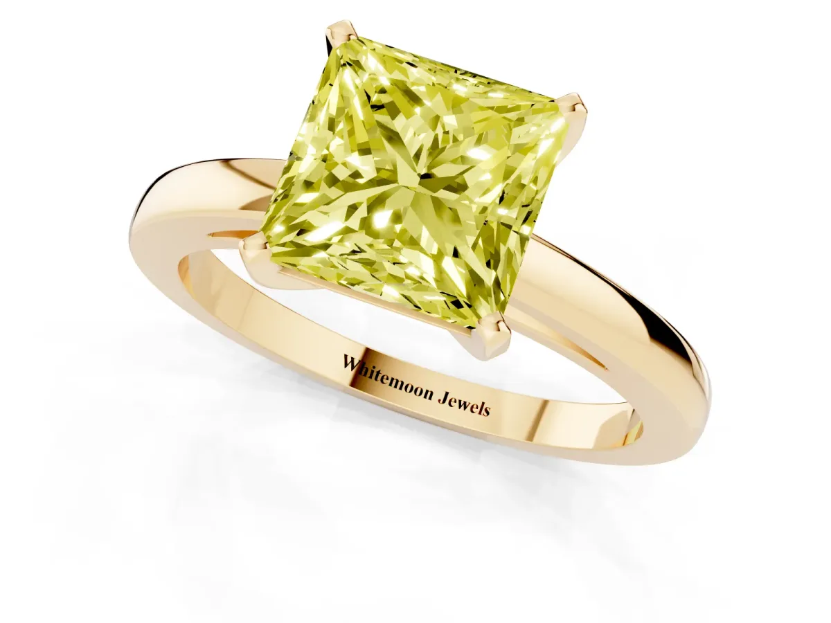 Fancy Yellow Princess Cut Solitaire Diamond Engagement Ring with Four-Prong Setting on a Classic Band Yellow gold