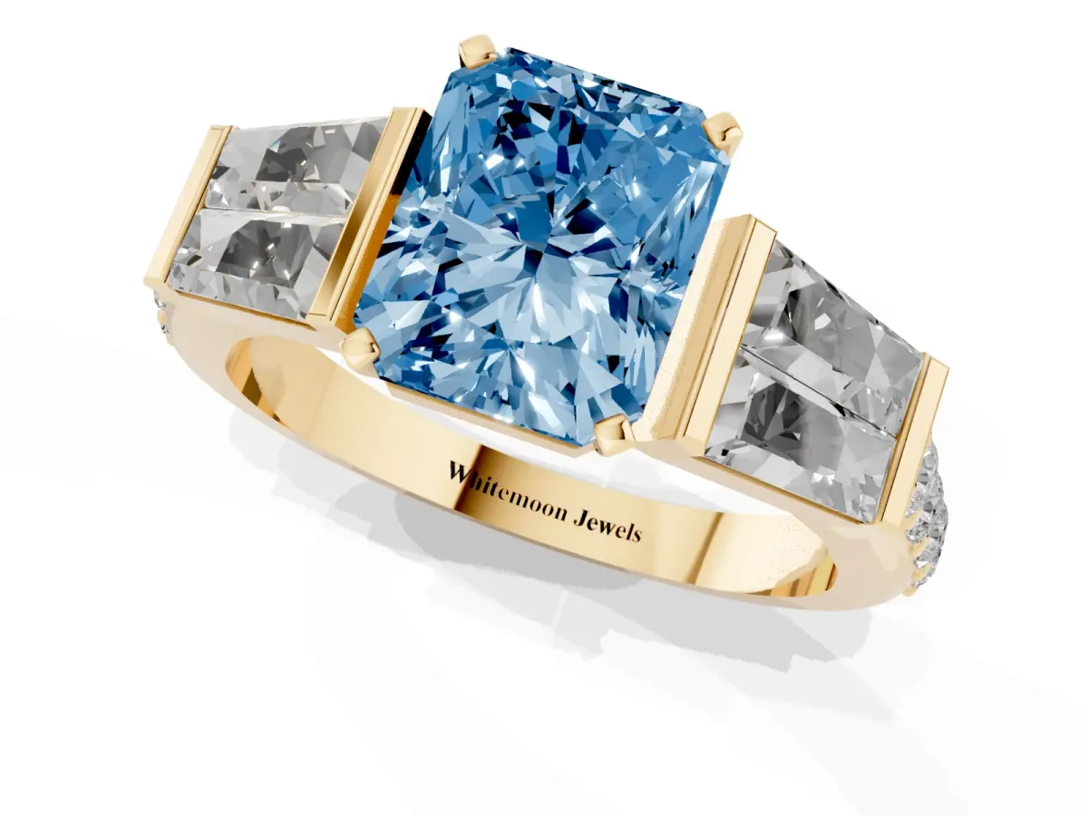 Fancy Blue Radiant Cut Diamond Engagement Ring with Baguette Side Stones and Channel Set Band Yellow gold