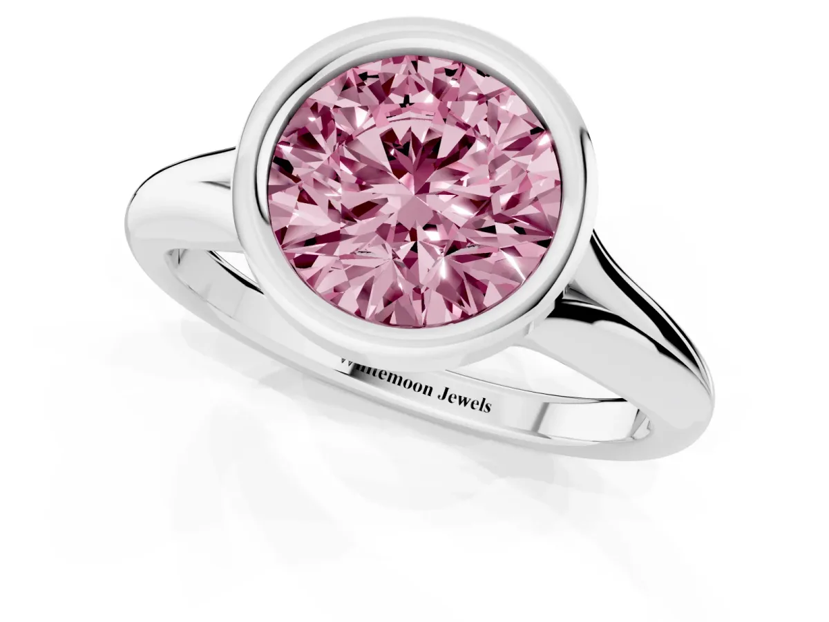 Fancy Pink Bezel Set Round Cut Solitaire Diamond Ring with Smooth Band Silver