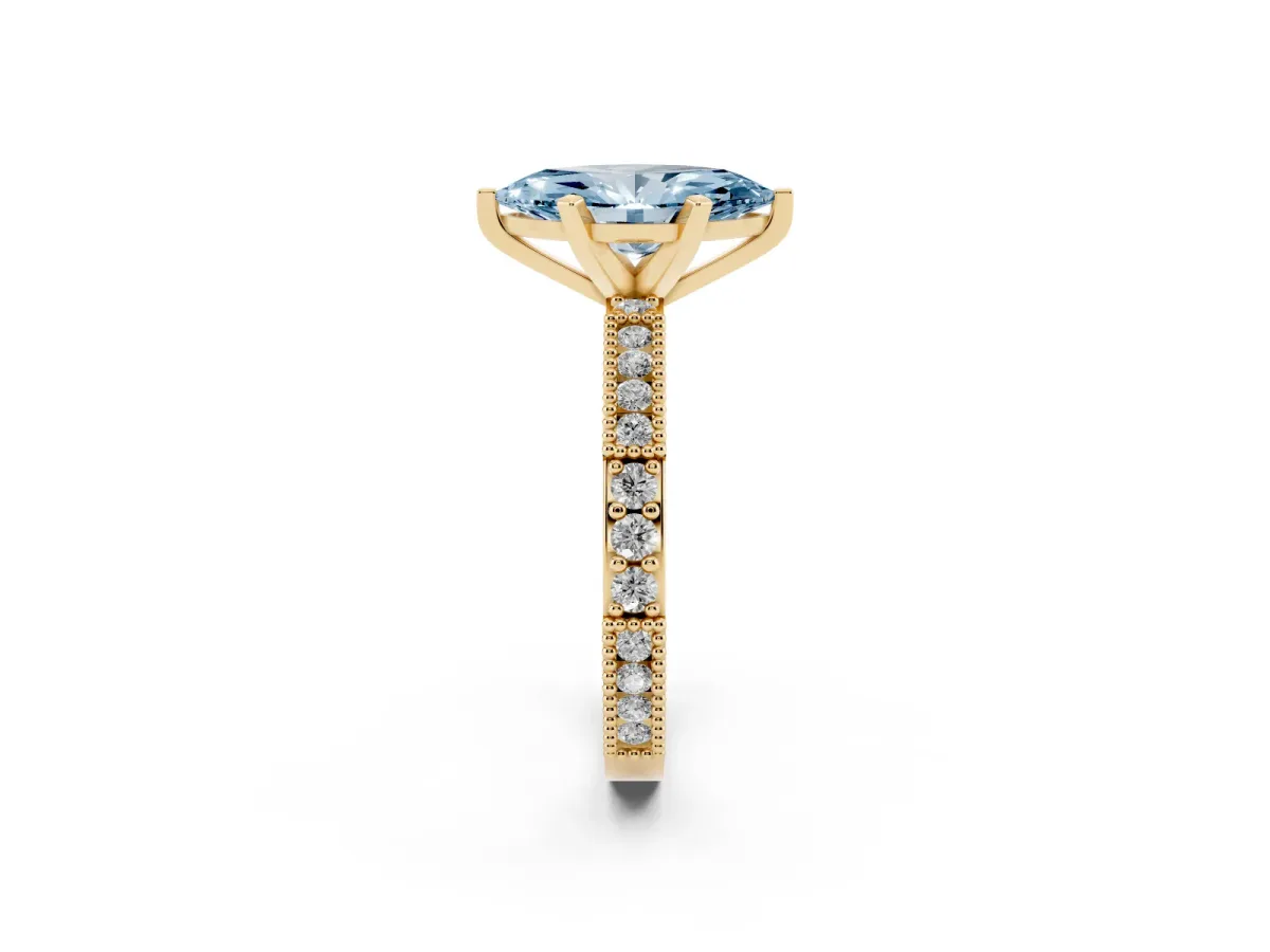 Fancy Blue Marquise Cut Solitaire with Pavé Band and Four-Prong Setting Yellow gold