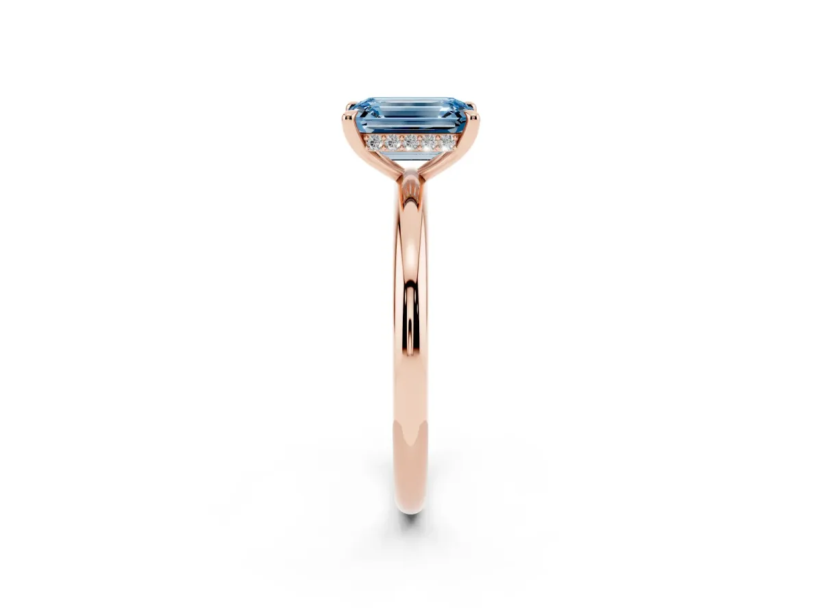 Fancy Blue Emerald Cut Diamond Solitaire Ring with Thin Band and Four-Prong Setting Rose gold