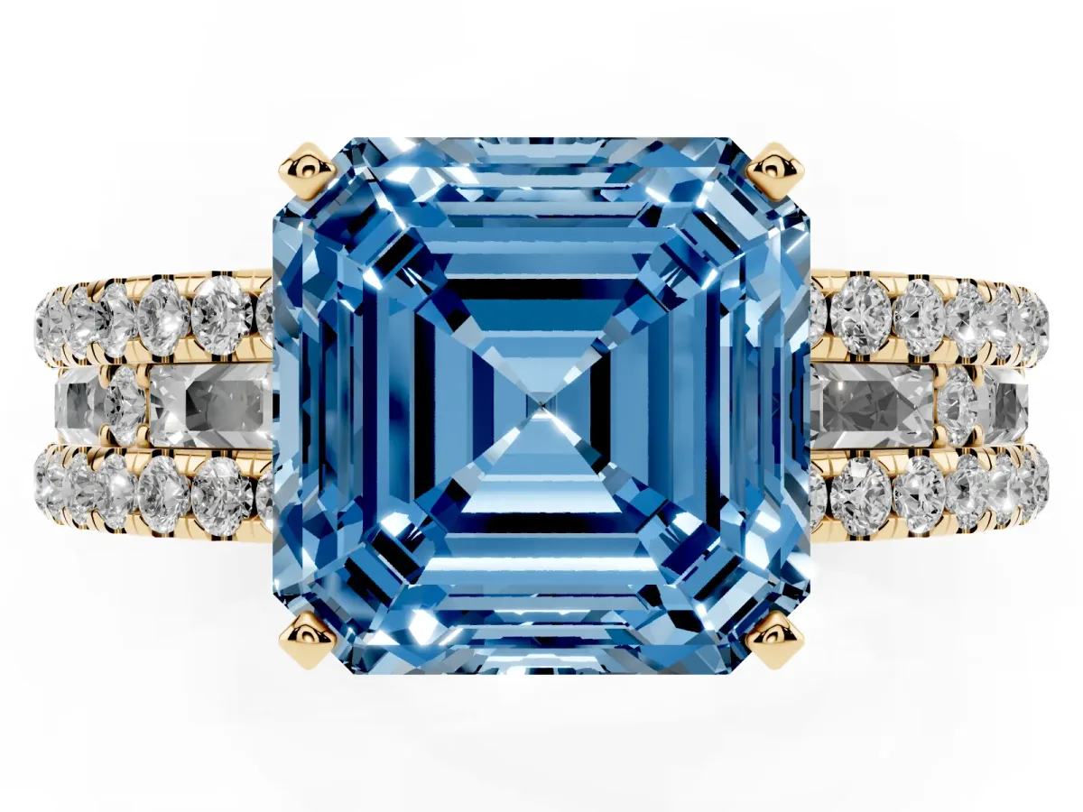 Fancy Blue Asscher Cut Diamond Solitaire Ring with Pavé and Channel Set Band Yellow gold