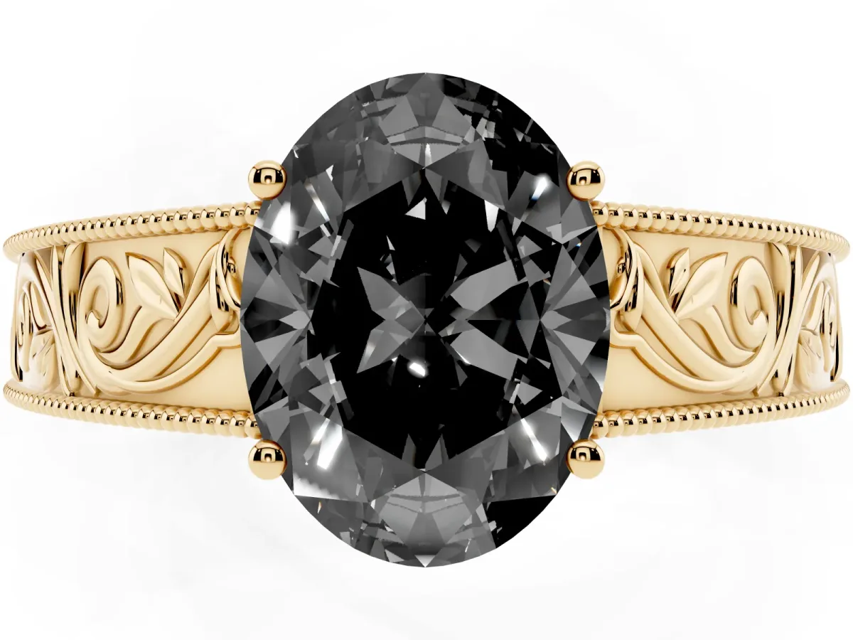 Fancy Black Oval Cut Diamond Solitaire Ring with Engraved Band and Four-Prong Setting Yellow gold