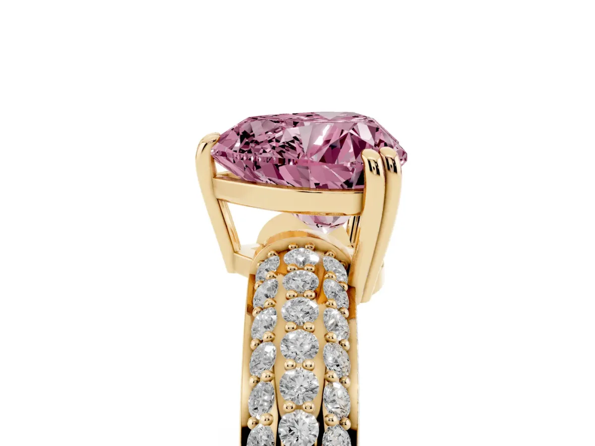 Fancy Pink Heart Cut Diamond Solitaire Ring with Multi-Row Round Pavé Band and Prong Setting Yellow gold