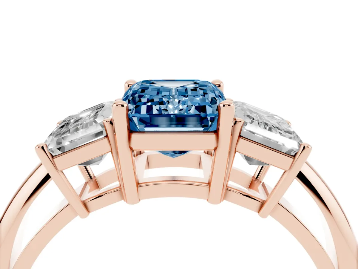Fancy Blue Three-Stone Emerald Cut Cut Diamond Engagement Ring with Prong Setting on a White Gold Band Rose gold