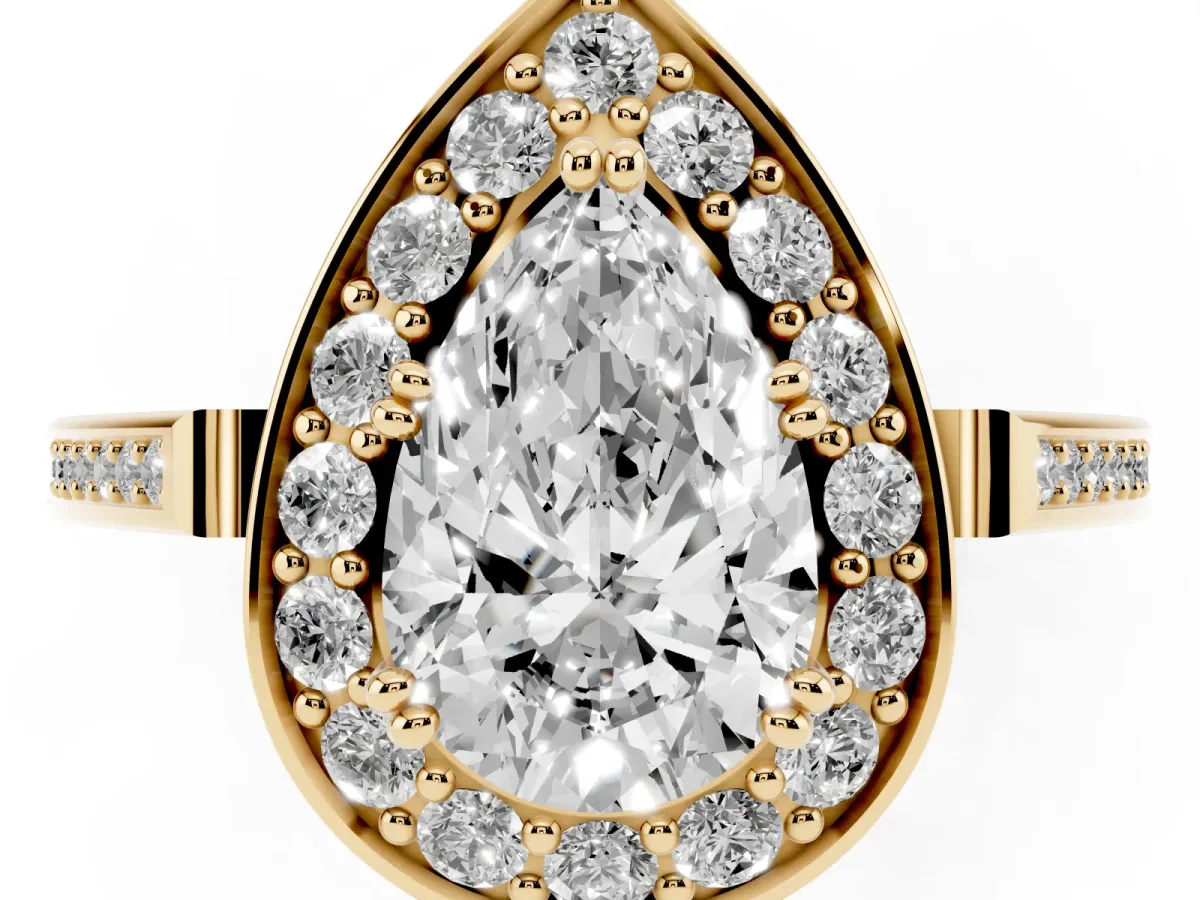 Pear Cut Diamond Halo Ring with Split Shank and Four-Prong Setting Yellow gold