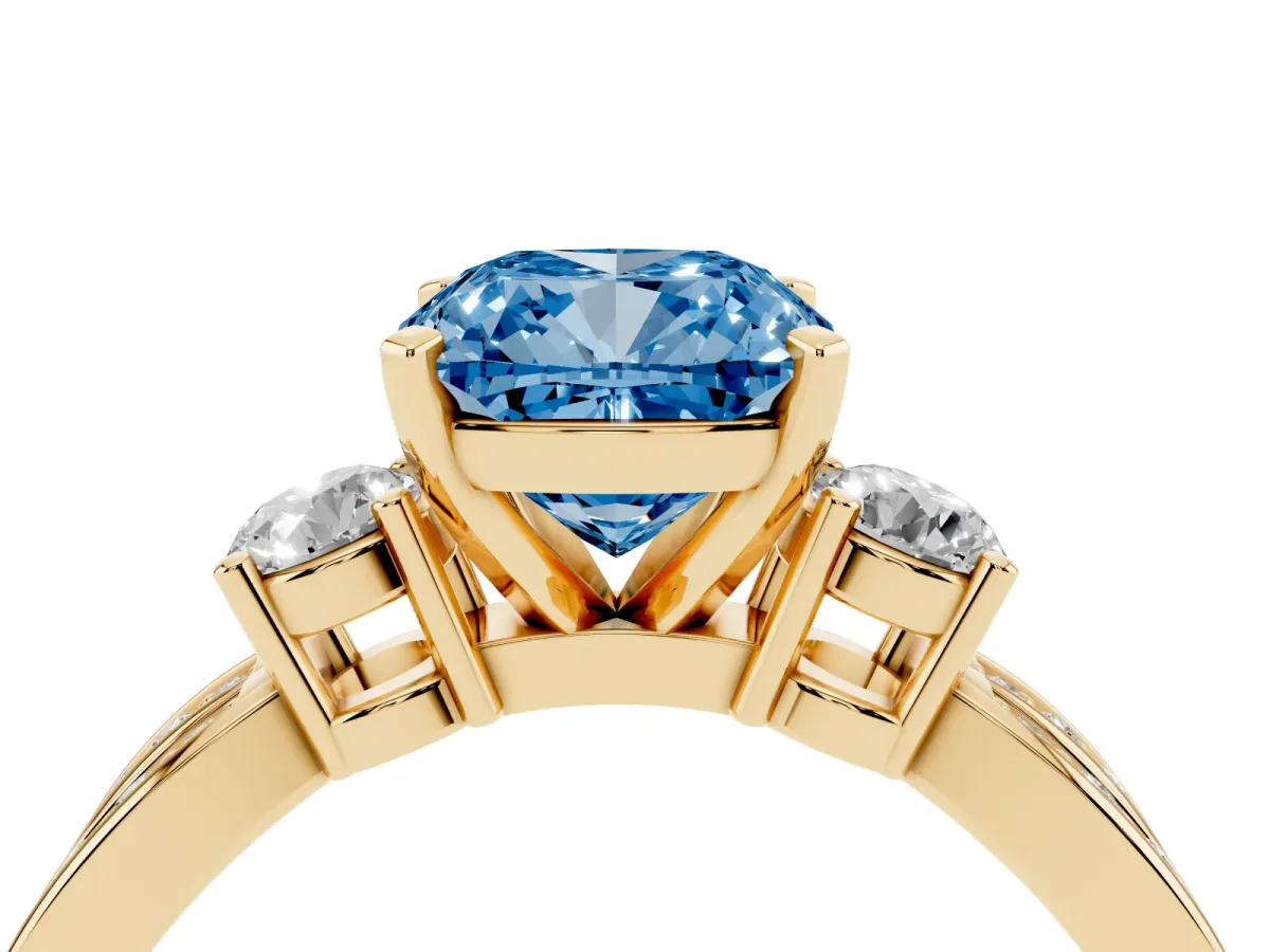 Fancy Blue Three-Stone Cushion Cut Cut Diamond Twist Band with Prong Setting Yellow gold
