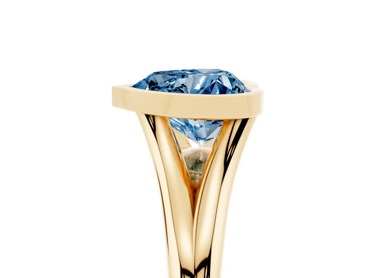 Fancy Blue Bezel Set Heart Cut Cut Solitaire Ring with Tapered Band Yellow gold
