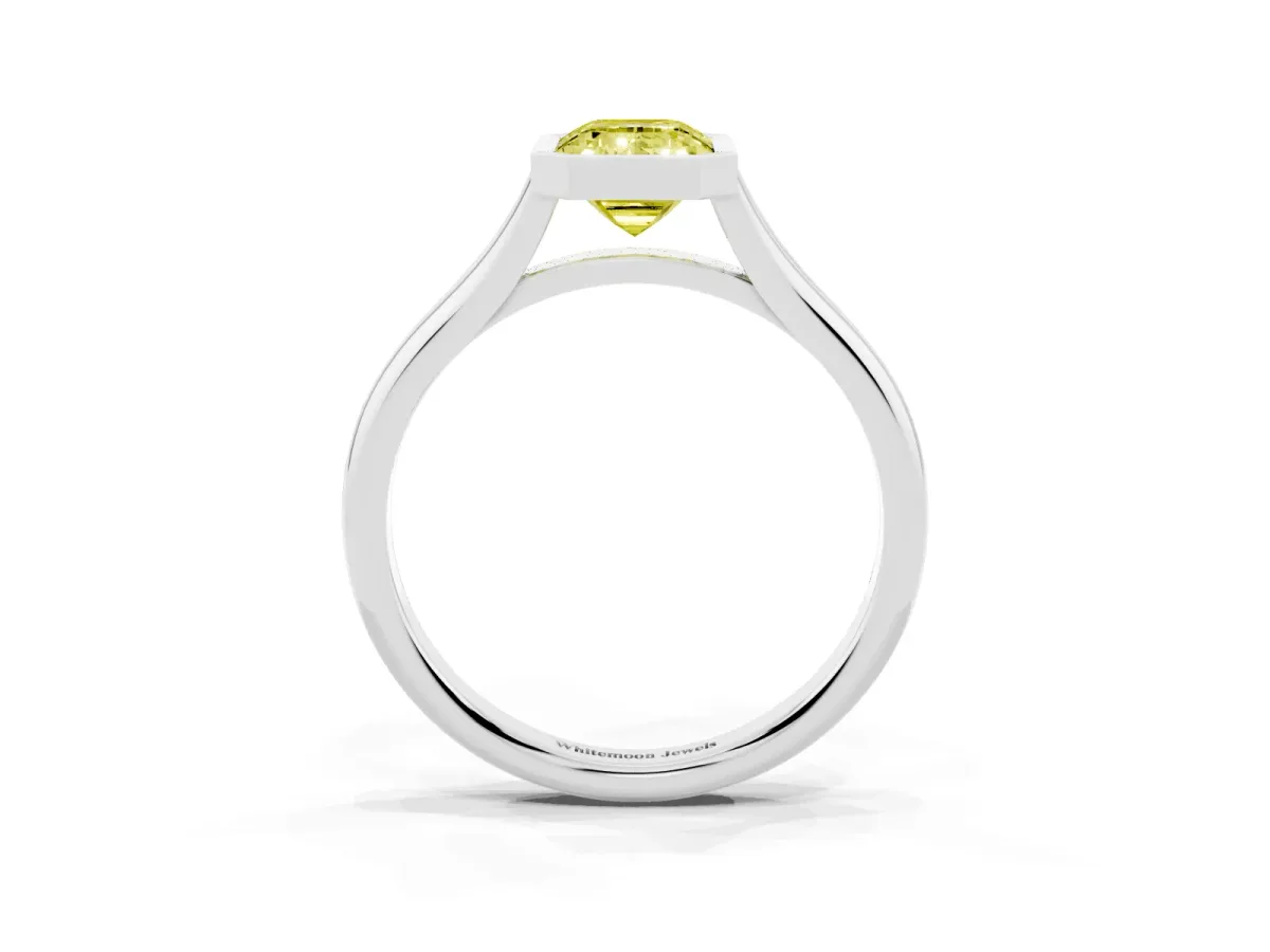Fancy Yellow Bezel Set Emerald Cut Cut Solitaire Ring with Tapered Band Platinum