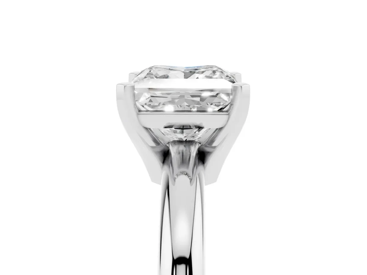 Princess Cut Diamond Solitaire Engagement Ring with Round Band and Four-Prong Setting Silver