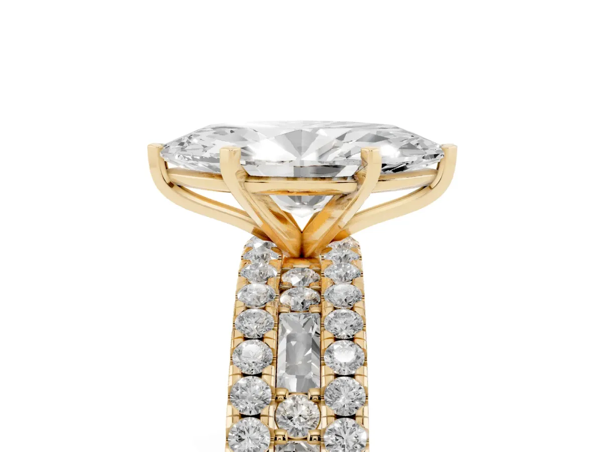 Marquise Cut Diamond Solitaire Ring with Pavé and Channel Set Band Yellow gold