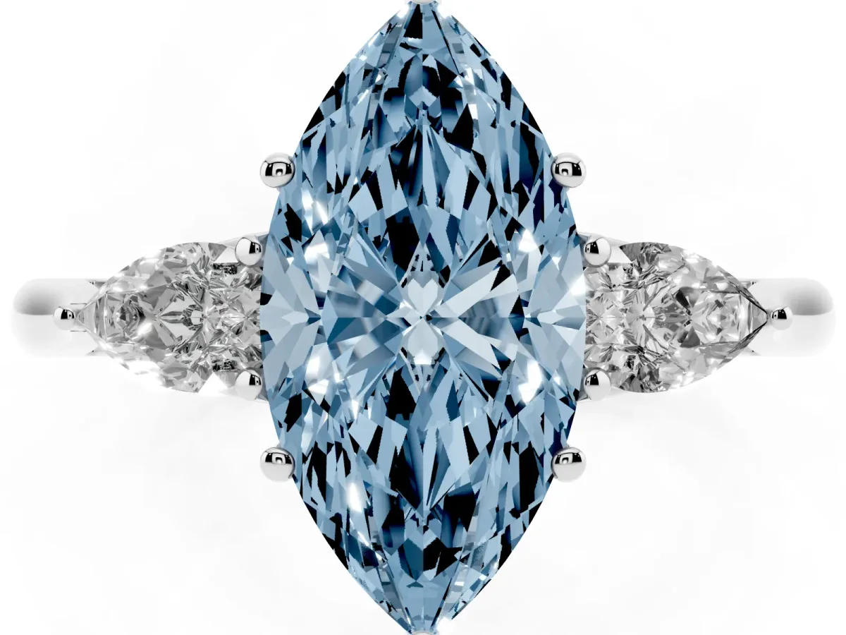 Fancy Blue Three-Stone Marquise Cut Diamond Ring with Pear Side Stones in Four-Prong Setting Silver