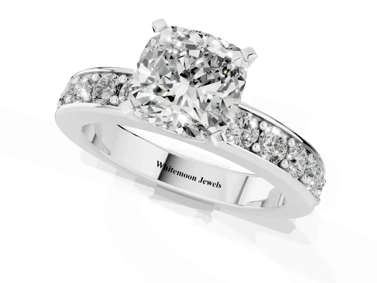 Cushion Cut Diamond Engagement Ring with Channel Set Round Band and Prong Setting Platinum