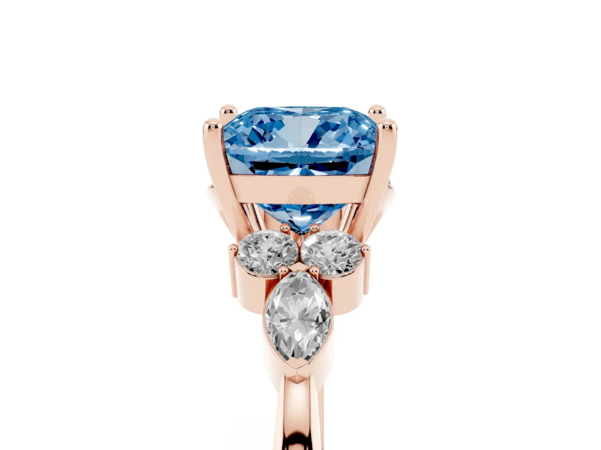 Fancy Blue Cushion Cut Brilliant Diamond Solitaire Ring with Pear Side Stones and Four-Prong Setting Rose gold