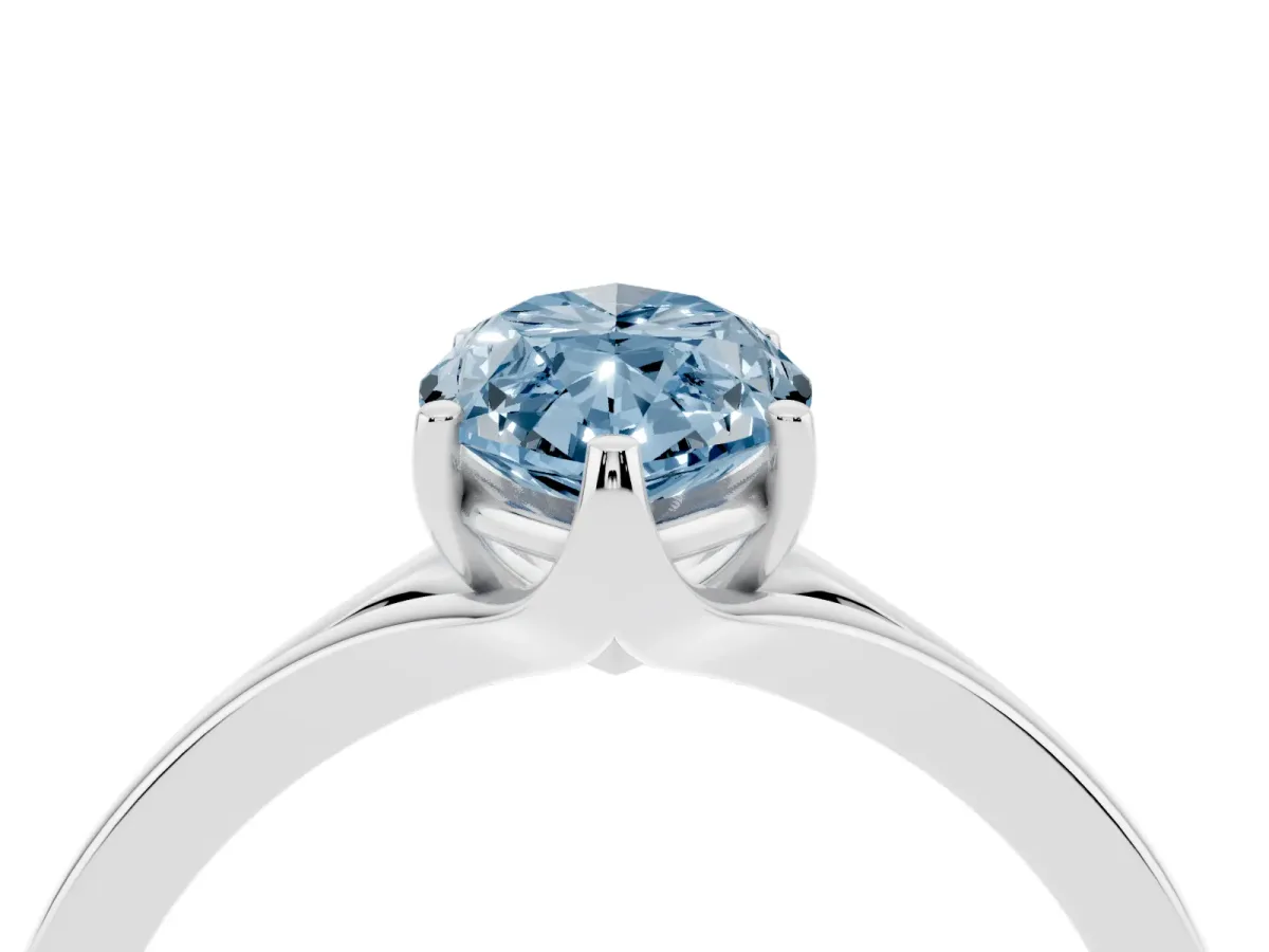 Fancy Blue Marquise Cut Solitaire Diamond Ring with Six-Prong Setting and Tapered Band Platinum