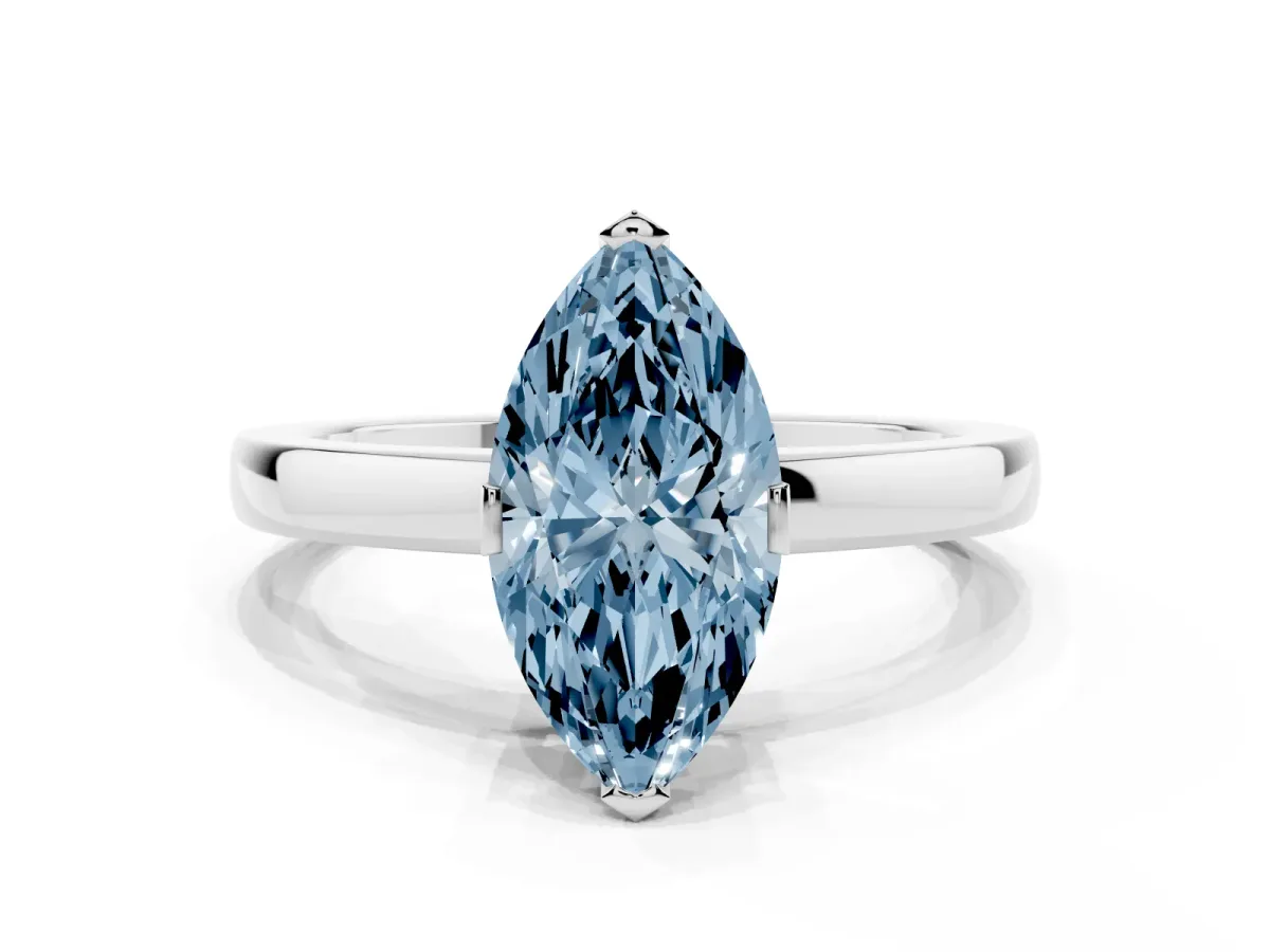 Fancy Blue Marquise Cut Cut Solitaire Ring with Four-Prong Setting and Classic Band Silver
