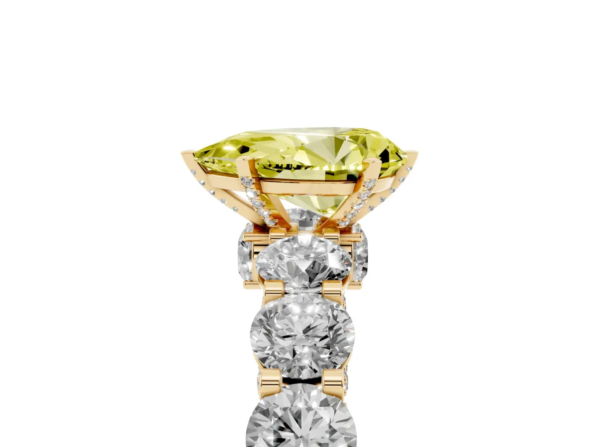 Fancy Yellow Pear Cut Diamond Side Stone Engagement Ring with Four-Prong Setting Yellow gold