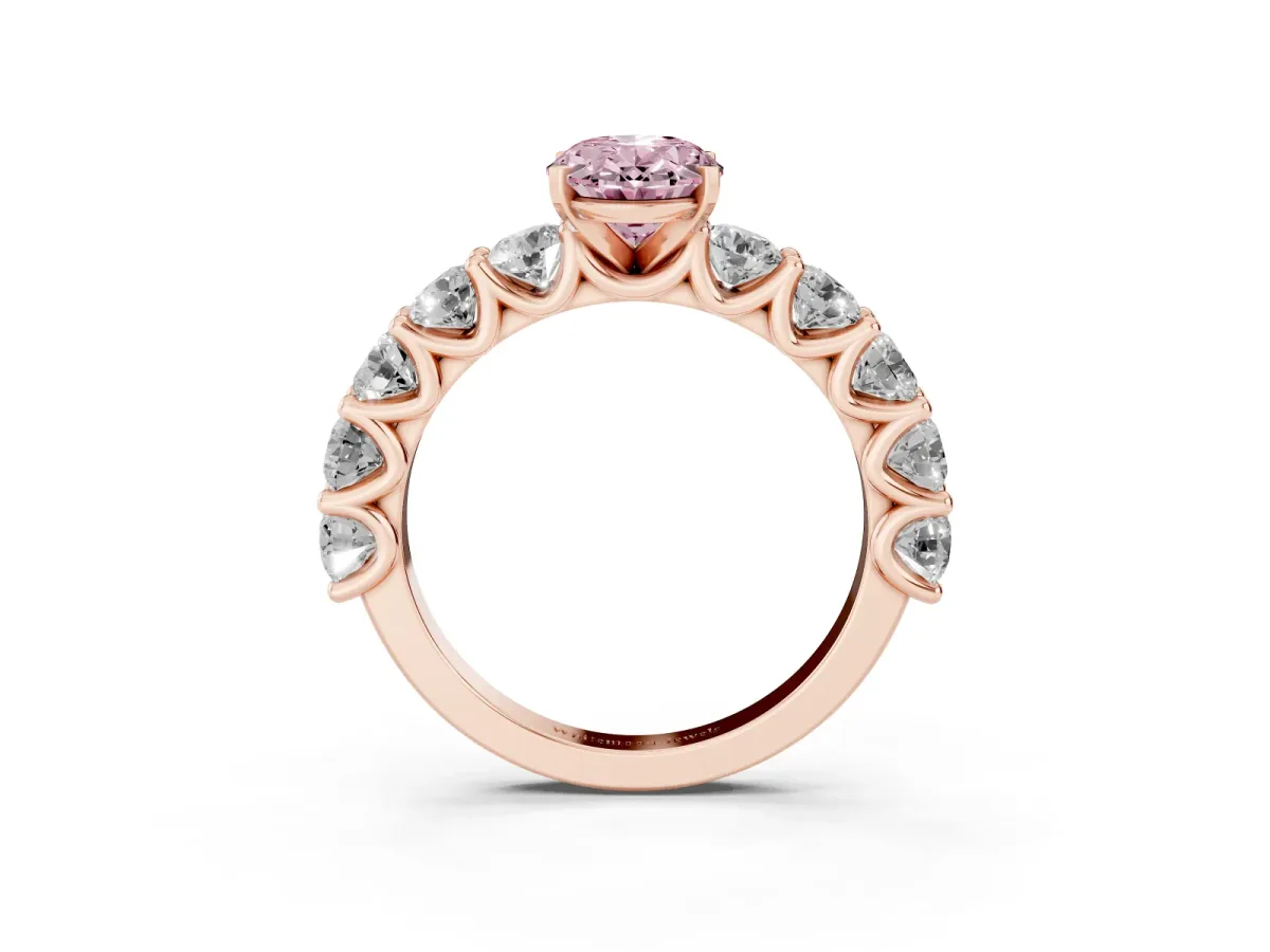 Fancy Pink Oval Cut Diamond Prong Setting with Side Stones on a Pave Band Rose gold