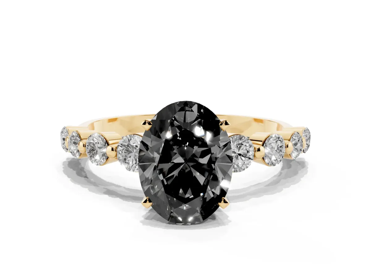 Fancy Black Oval Cut Solitaire Diamond Ring with Pave Band and Four-Prong Setting Yellow gold