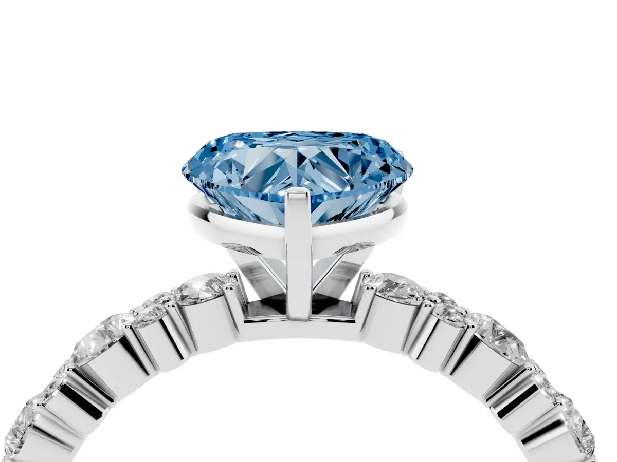 Fancy Blue Heart Cut Diamond Side Stone Solitaire Ring with Round and Four-Prong Setting Silver