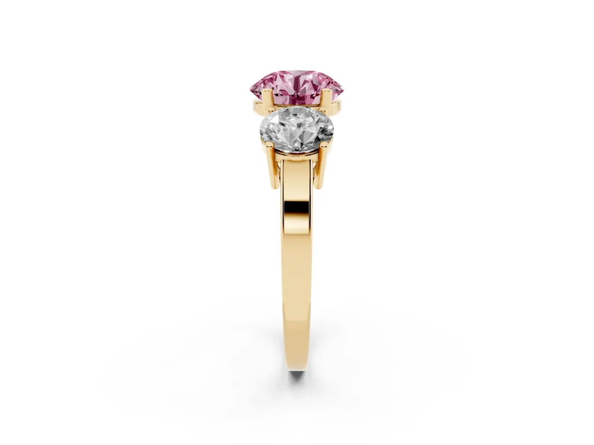 Fancy Pink Three-Stone Round Cut Cut Diamond Engagement Ring with Flat Band and Four-Prong Setting Yellow gold