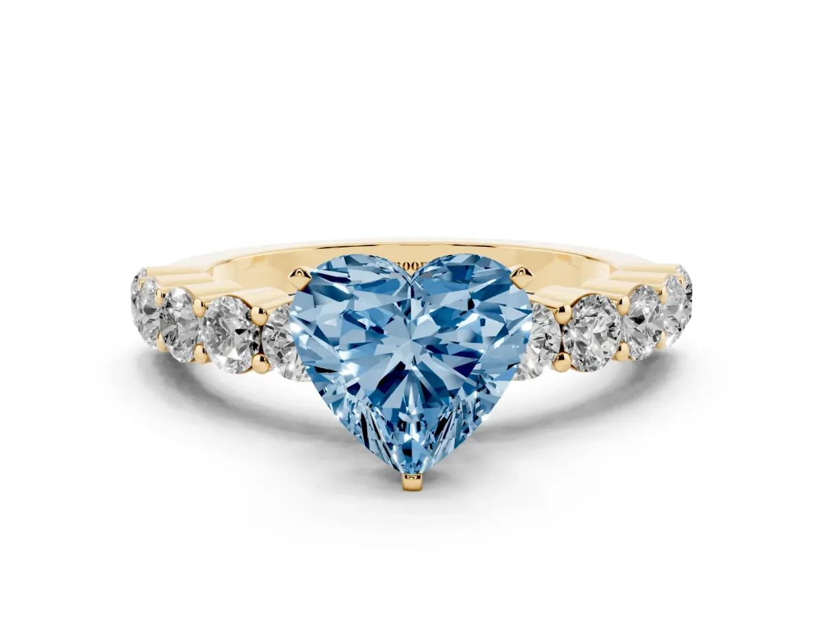 Fancy Blue Heart Cut Diamond Solitaire Ring with Shared Prong Round Side Stones Yellow gold
