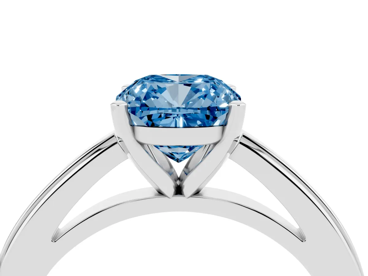 Fancy Blue Cushion Cut Solitaire Diamond Ring with Four-Prong Setting and Classic Band Platinum