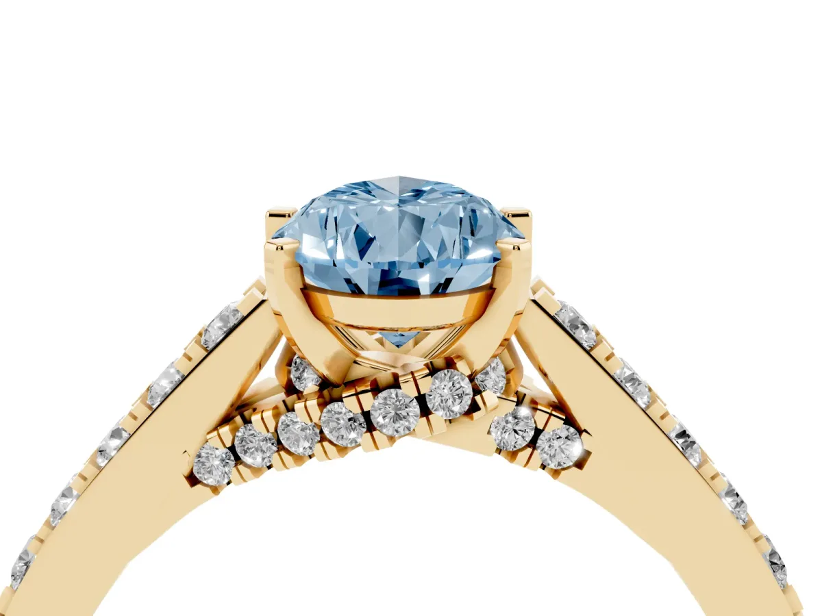 Fancy Blue Pear Cut Diamond Solitaire Ring with Crossover Gallery and Round Pavé Band Yellow gold