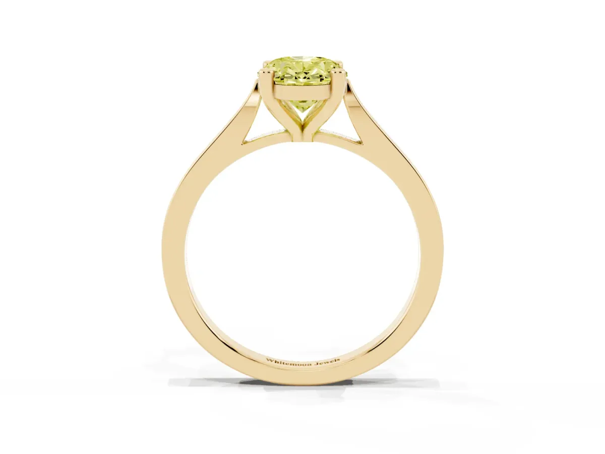Fancy Yellow Oval Cut Solitaire Diamond Ring with Four-Prong Setting and Tapered Band Yellow gold