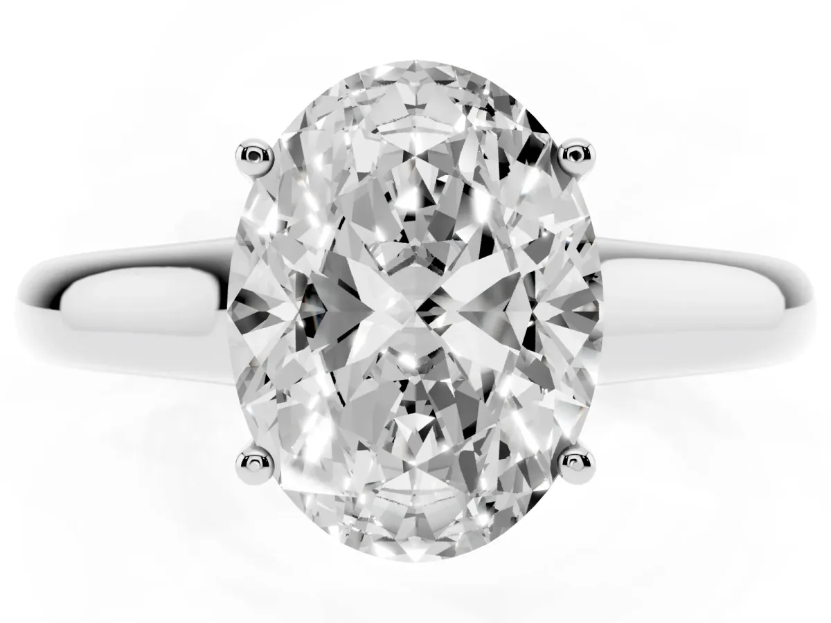 Oval Cut Solitaire Engagement Ring with Tapered Band and Four-Prong Setting Platinum
