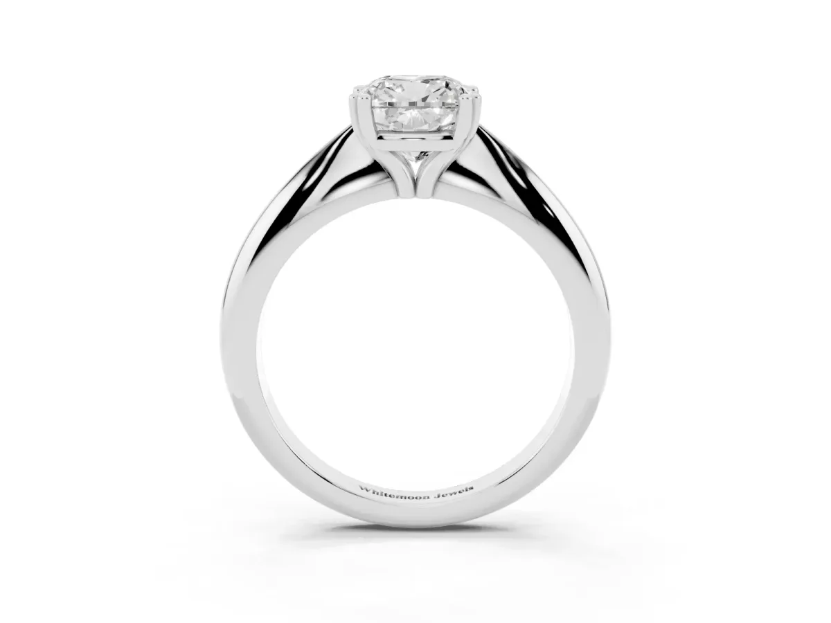 Cushion Cut Cut Solitaire Engagement Ring with Tapered Band and Four-Prong Setting Platinum