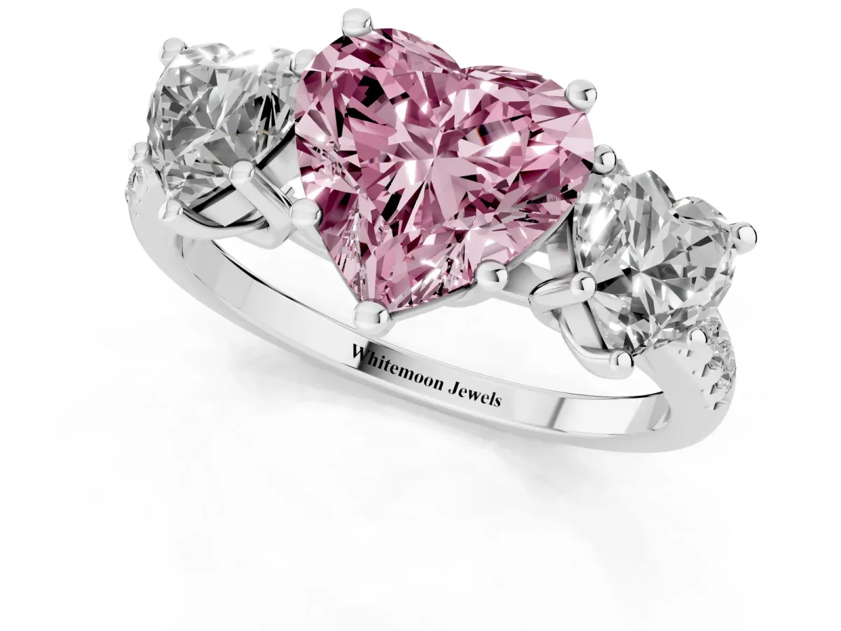 Fancy Pink Three-Stone Heart Cut Diamond Ring with Round Pavé Band and Prong Setting Silver