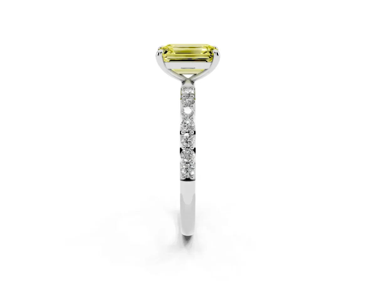 Fancy Yellow Emerald Cut Diamond Solitaire Ring with Round Pavé Band and Prong Setting Silver