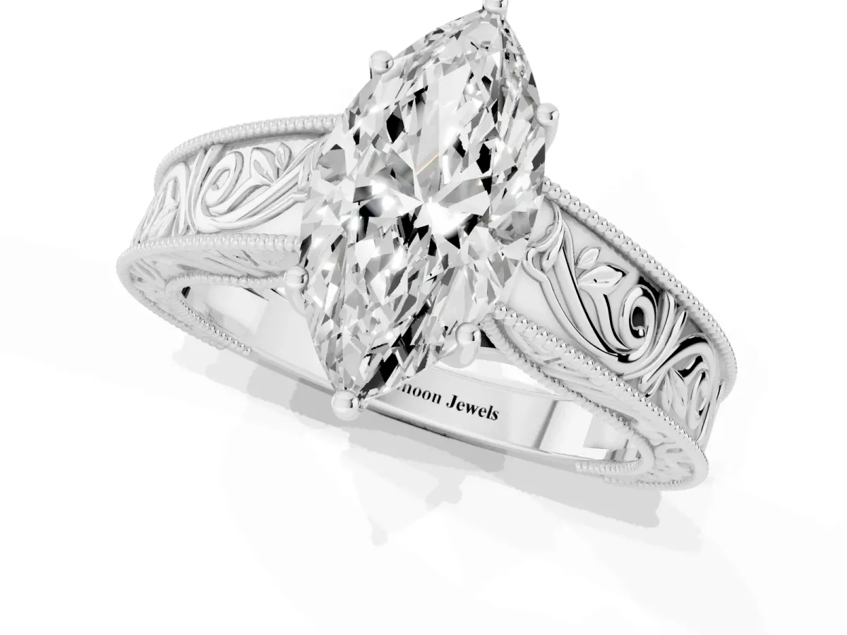 Marquise Cut Diamond Solitaire Ring with Engraved Band and Four-Prong Setting Silver