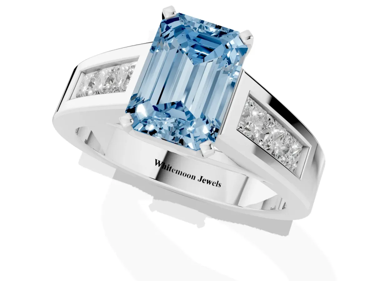 Fancy Blue Emerald Cut Cut Channel Set Solitaire Ring with Four-Prong Setting Platinum