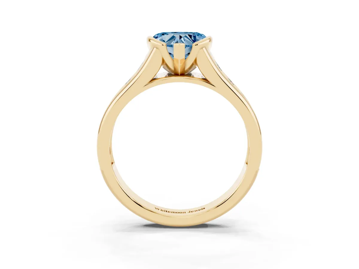 Fancy Blue Heart Cut Solitaire Bezel-Set Diamond Ring with Channel-Set Band Yellow gold
