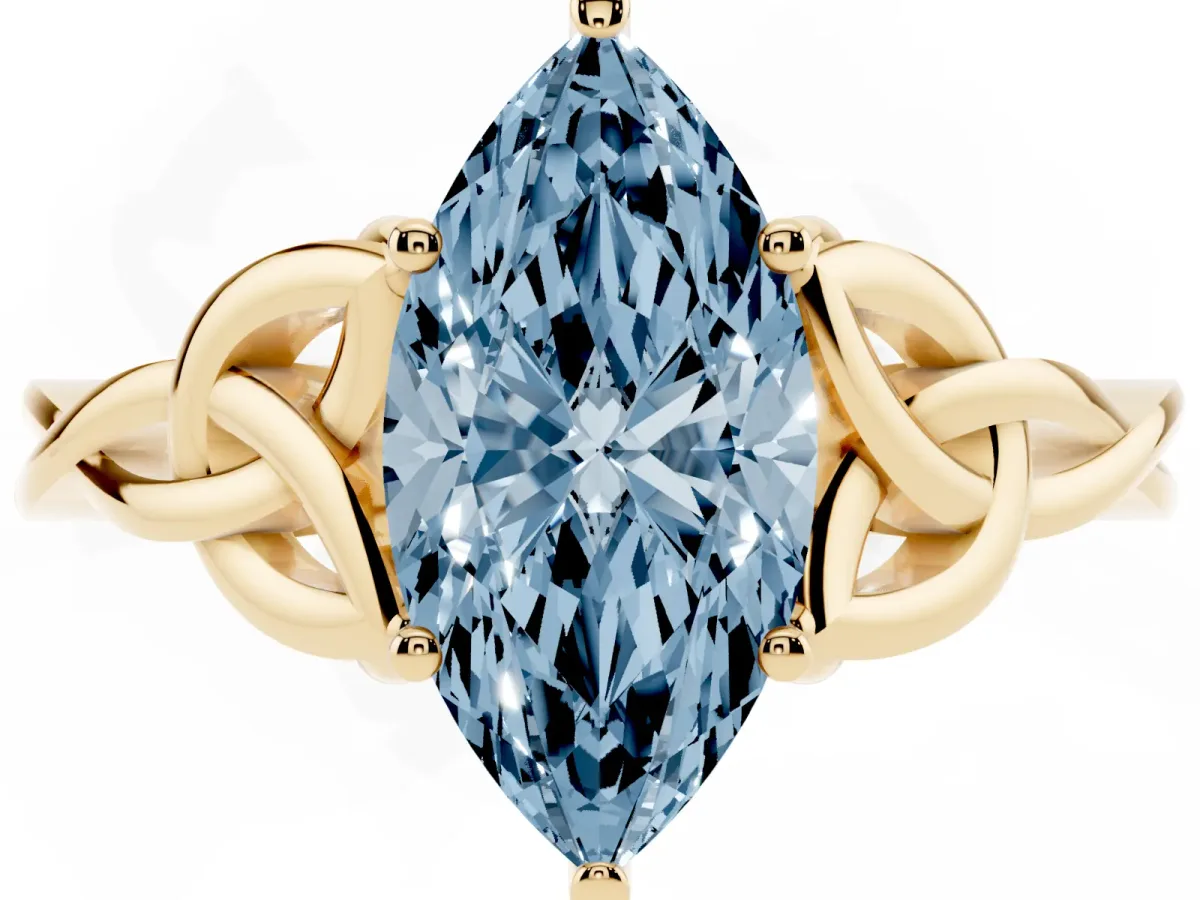 Fancy Blue Marquise Cut Diamond Solitaire Engagement Ring with Celtic Knot Band and Four-Prong Setting Yellow gold