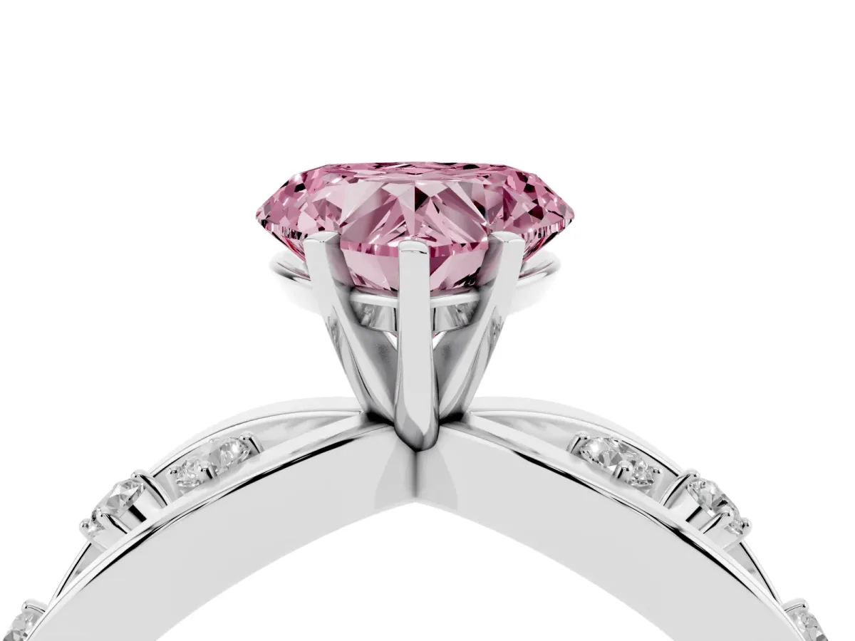 Fancy Pink Heart Cut Cut Solitaire Diamond with Side Stones on Criss-Cross Band and Four-Prong Setting Silver