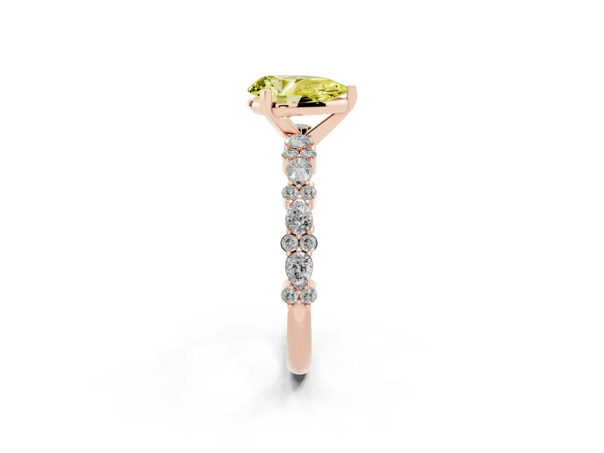Fancy Yellow Pear Cut Diamond Side Stone Solitaire Ring with Round and Four-Prong Setting Rose gold