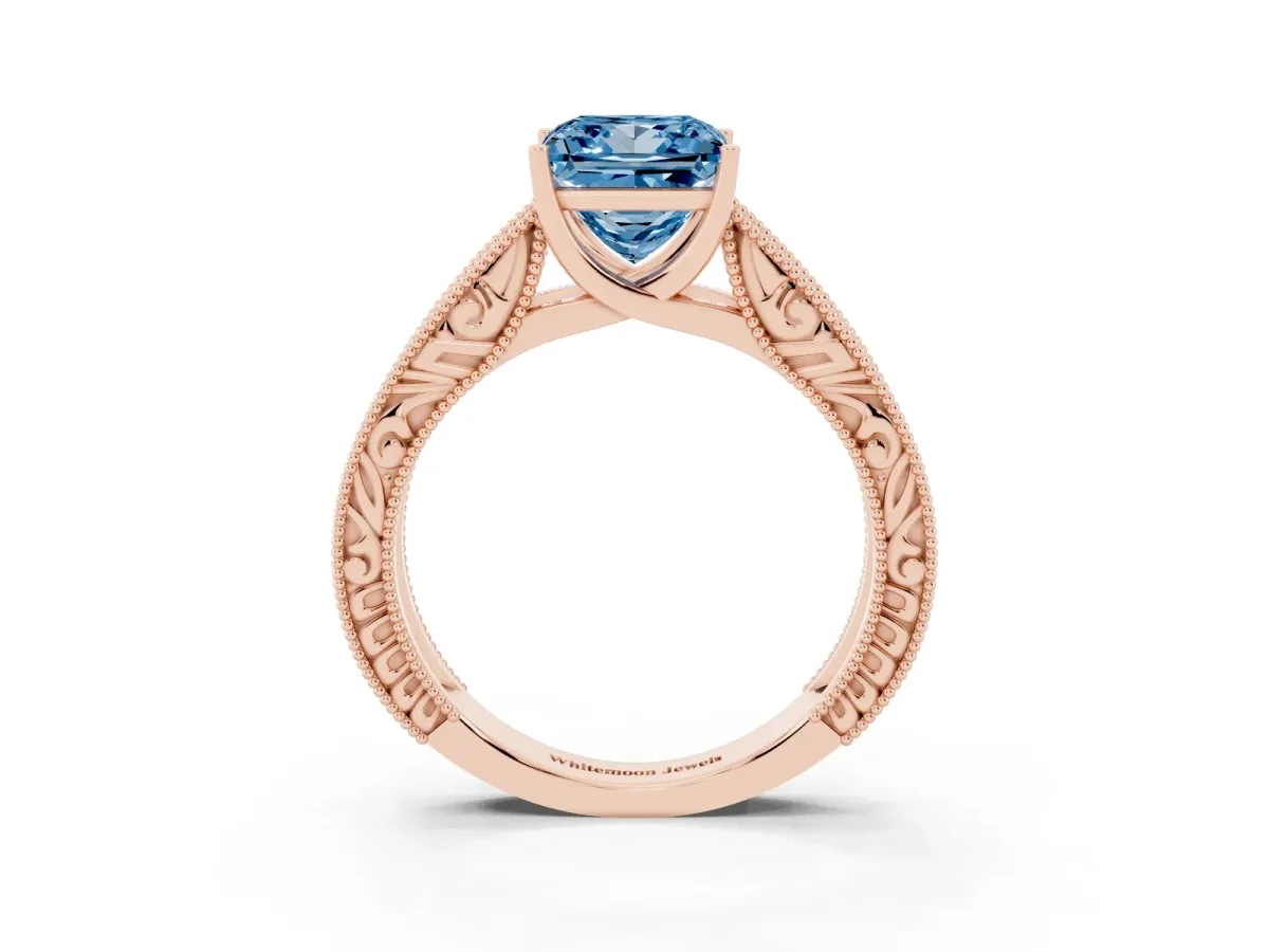 Fancy Blue Princess Cut Diamond Solitaire Ring with Engraved Band and Four-Prong Setting Rose gold