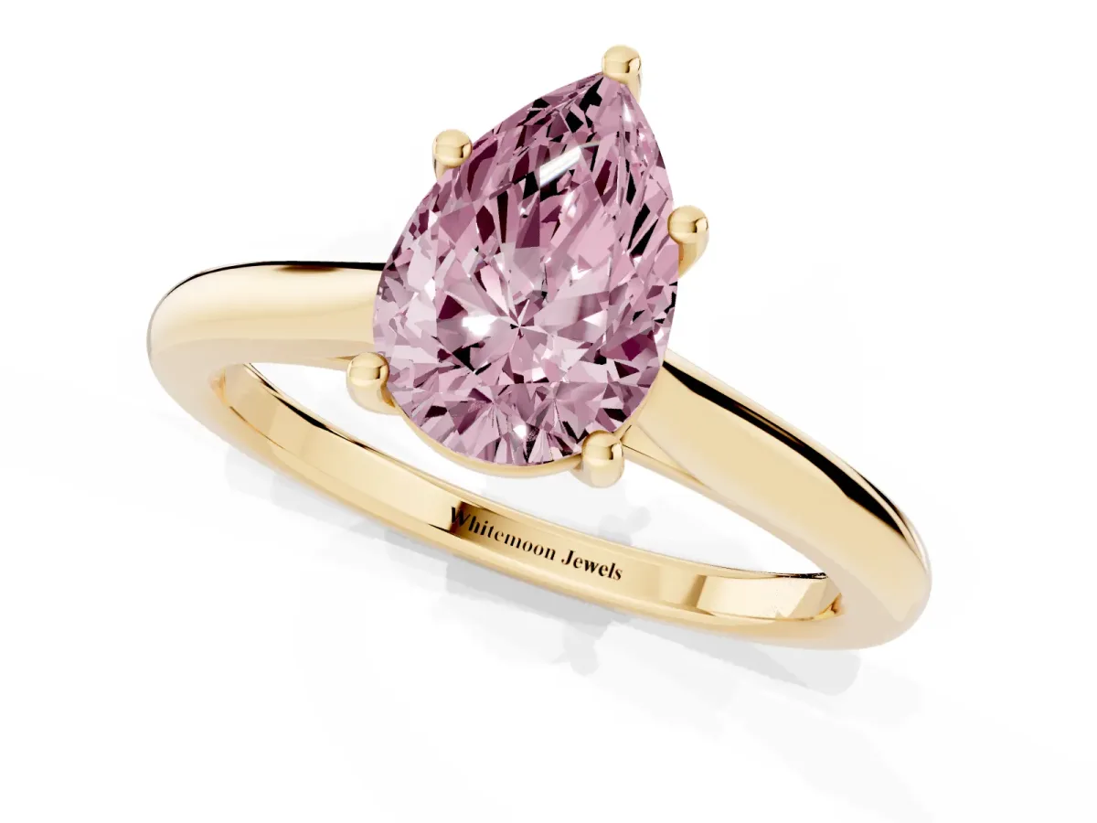 Fancy Pink Pear Cut Cut Solitaire Ring with Cathedral Band and Four-Prong Setting Yellow gold