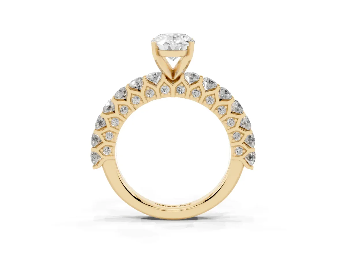 Oval Cut Diamond Solitaire Ring with Shared Prong Pavé Band and Four-Prong Setting Yellow gold