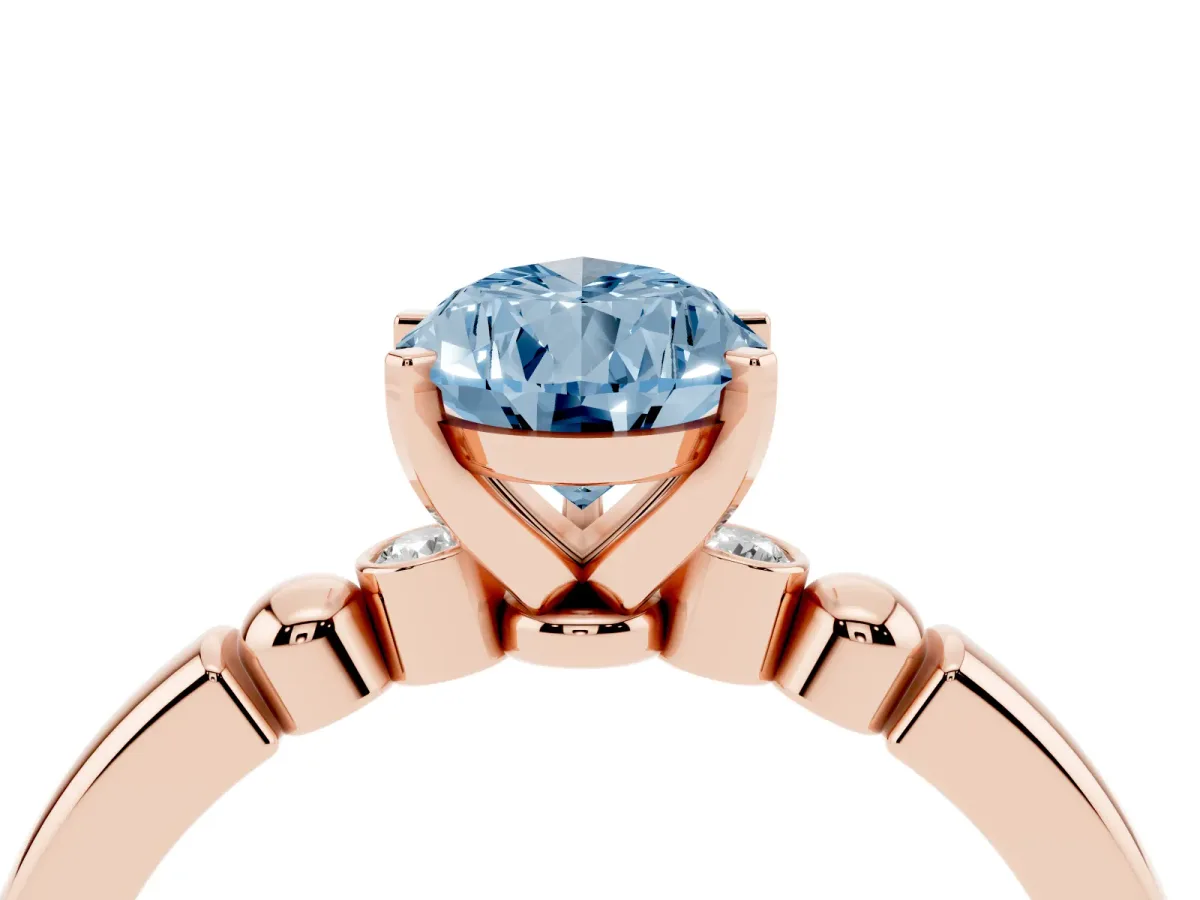 Fancy Blue Pear Cut Solitaire Beaded Band with Four-Prong Setting Rose gold