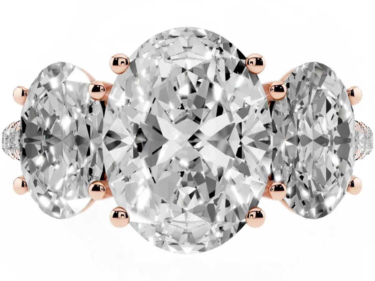 Three-Stone Oval Cut Diamond Ring with Round Pavé Band and Prong Setting Rose gold